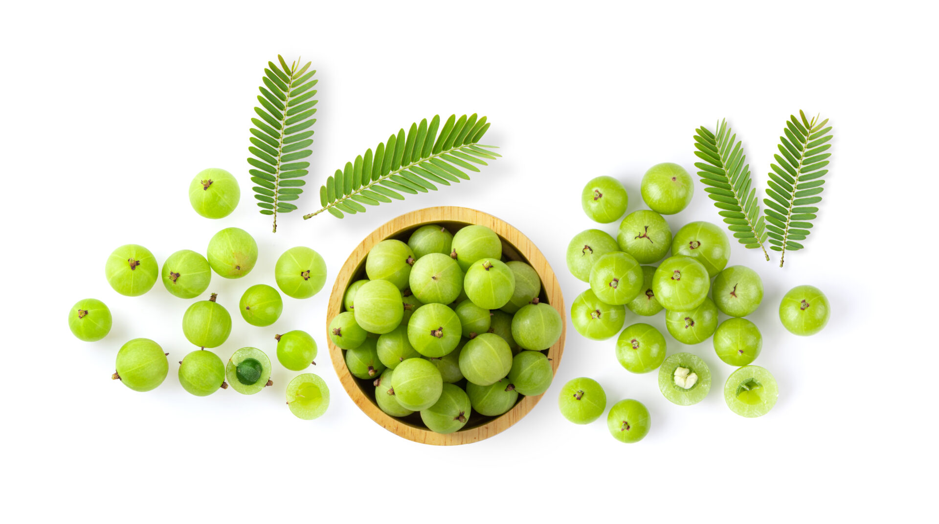 Indian gooseberry with leaves on white background